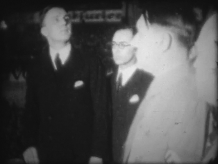 Gareth Jones on stage withHhitler at Frankfurt Nazi rally February 23, 1933