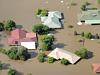  Homes near Ipswich west of Brisbane are inundated by flood waters Jan. 12, 2011. Brisbane and Ipswich are bracing for their ...